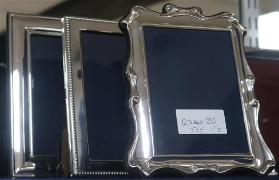 Three assorted 1980s/1990s silver mounted photograph frames, largest 20cm.
